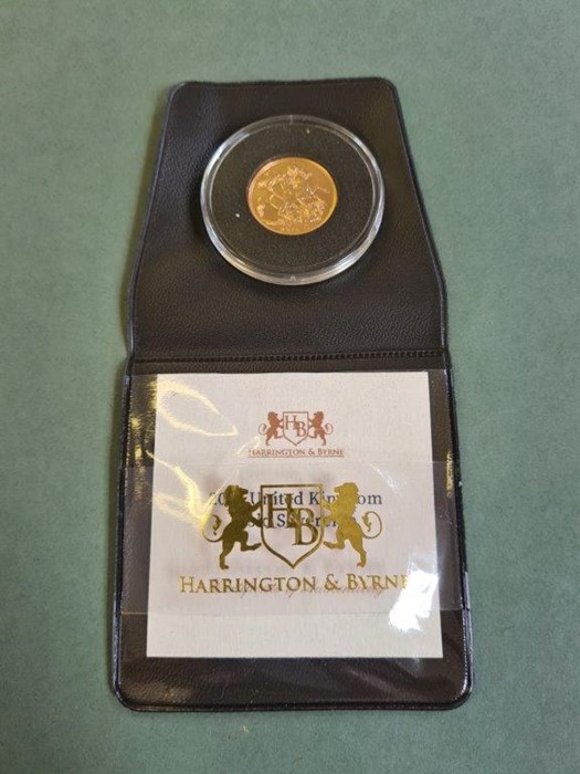 2015 uncirculated full gold sovereign in Harrington & Byrne wallet.