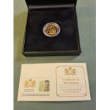 2014 uncirculated full gold sovereign in presentation box.