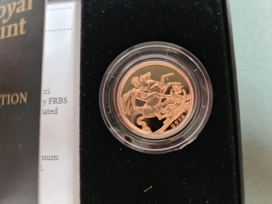 Royal Mint 2014 uncirculated full gold sovereign in presentation box with booklet and numbered - Image 2 of 3