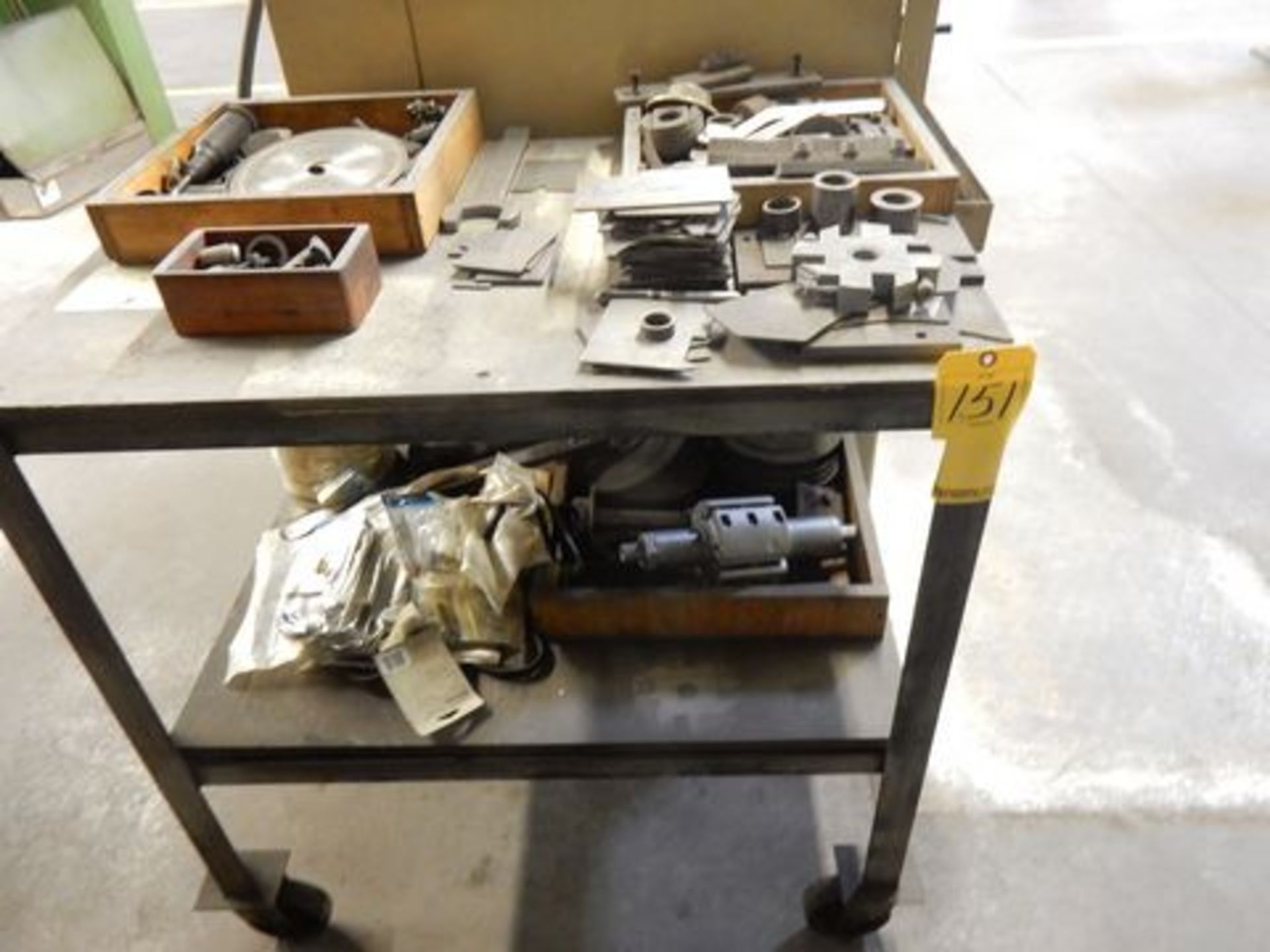 LOT ROLLAROUND TABLE W/CONTENTS TO INCLUDE MISC. MACHINE PARTS