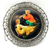 Russian papier mache circular brooch decorated with Fairytale scene, titled and inscribed verso,