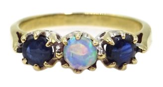 9ct gold cabochon sapphire and opal ring,