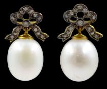 Pair of pearl and diamond bow pendant earrings Condition Report & Further Details