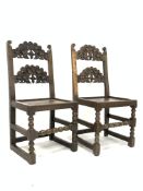 Near pair of early 18th century Derbyshire oak country chair, with scroll carved back,