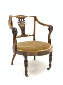 Late Victorian rosewood salon elbow chair of circular form,