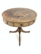 Regency style mahogany drum shaped library table, the top inset with tooled leather writing surface,