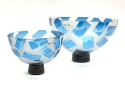 Pair of Gillies Jones Rosedale graduated glass bowls with cut and overlay blue glass panels on a