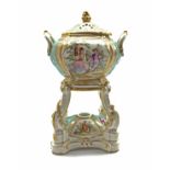 Berlin two handled parfumiere with pierced oval cover,