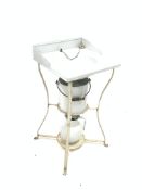 Enamel sink with galleried back, on a white painted metal two tier stand, W44cm,
