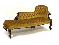 Victorian walnut framed chaise lounge, with carved scrolled acanthus leaf arm terminals,