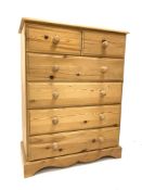 20th century solid pine chest, rectangular moulded top above two short and four long drawers,