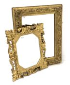 Gilt wood and gesso framed rectangular wall mirror, having trailing floral design to edge,