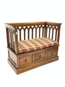Modern mahogany 'Ancient Mariner' settle, with shaped and pierced back rest,