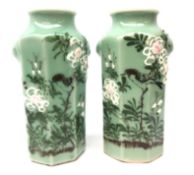 Pair Chinese celadon glaze vases, octagonal form with moulded and painted decoration,