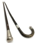 Sectional horn walking stick with white metal mounts and a cane with engraved top