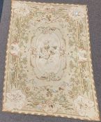 Aubusson design beige ground rug, decorated with central medallion, spandrels and trailing foliate,