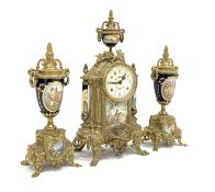 20th century brass clock garniture, the case of classical design having painted enamel columns,