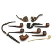 Two briar pipes with bulls head bowls, German pipe with flexible horn stem, English pipes by Hunter,