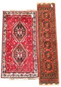 Persian design ground rug, double pole medallion on red field,