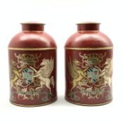 Pair of tole peinte tea canisters painted with a coat of arms on a red ground H33cm