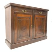 Early 20th century side cabinet, moulded top above two drawers and two panelled cupboards,