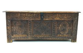 19th century oak coffer, all over carved with foliage, leafage and scrolls,