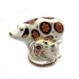 Royal Crown Derby 'Pig' paperweight with ceramic stopper and an Imari piglet paperweight with gold