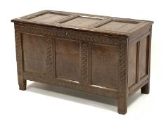 18th century oak coffer, carved hinged lid over guilloche carved three panelled front,