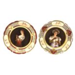 Pair of early 20th Century Vienna style porcelain plates each decorated with a female figure