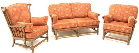 Ercol 'cloister' elm three piece suite, comprising of two seat sofa,