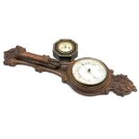 Late Victorian scroll carved oak aneroid barometer and thermometer H87cm together with an octagonal