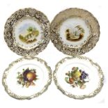 Pair of 19th Century porcelain plates painted with landscape panels within heavily gilded border