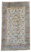 Large Persian Kashan beige carpet, ivory field decorated with trailing foliate,