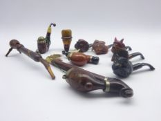 Nine novelty smoking pipes, predominantly Continental, including animal head and hedgehog briars,