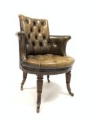 19th century mahogany framed library chair upholstered in deep buttoned brown leather,