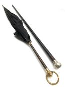 Black silk parasol with partridge wood handle and gilt metal mounts and a Victorian ebonised