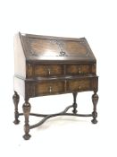 Early 20th century William and Mary design serpentine front oak bureau,