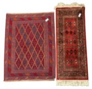 Central Asian flat and tufted weave red ground rug, repeating lozenge design, triple guarded border,