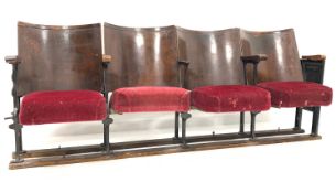 Set four early 20th century Art Deco cinema seats, each having bowed walnut back panel,