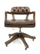 Mid 20th century walnut framed captains swivel chair, deep buttoned leather upholstered back,