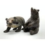 Black Forest carved wood bear with a fish L23cm and another of a seated bear Condition
