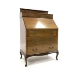 20th century Queen Anne style mahogany bureau, raised back above three sort drawers,