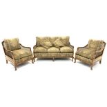 Early 20th century walnut and bergere lounge suite, comprising of a three seat sofa,