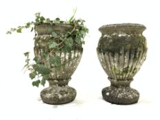 Pair of baluster shaped composite stone planters,