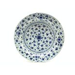 18th Century Delft dish decorated with floral sprigs in blue and white D34cm Condition