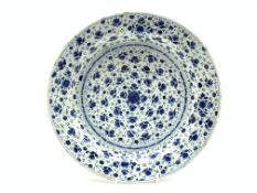 18th Century Delft dish decorated with floral sprigs in blue and white D34cm Condition