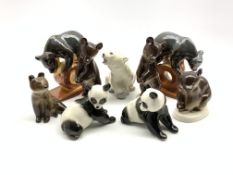 Nine Russian made ceramic models of bears including a pair of circus style bears,