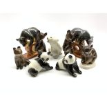 Nine Russian made ceramic models of bears including a pair of circus style bears,