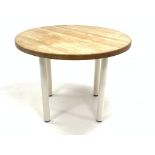 Habitat circular table with beech top, raised on removable white painted aluminium legs,