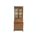 Edwardian mahogany bureau bookcase, the upper section enclosed by a pair of glazed tracery doors,